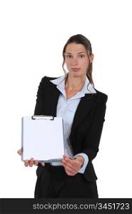 good-looking businesswoman holding clipboard