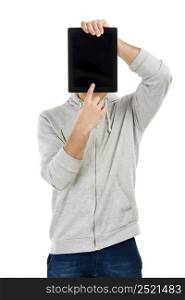 Good looking young man holding a tablet in front of is head and showing something