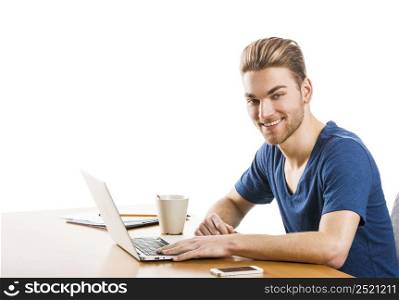 Good looking young man in the office working, isolated over white background