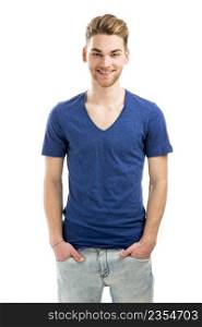 Good looking young man smiling with hands in the pockets, isolated on white background