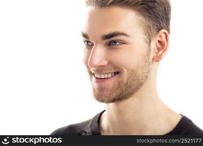 Good looking young man thinking, isolated on white background