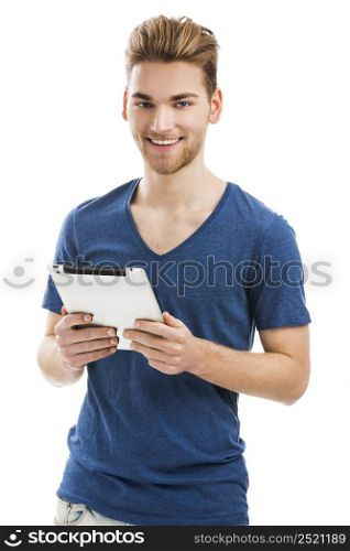 Good looking young man working on a tablet, isolated on white background