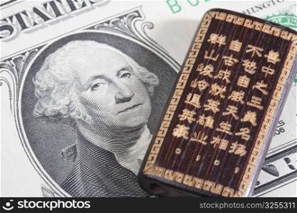 Good luck Chinese hand carved bamboo on a US paper currency