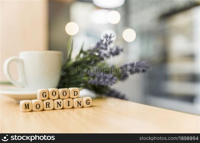 good morning cubic blocks with cup coffee wooden desk. Resolution and high quality beautiful photo. good morning cubic blocks with cup coffee wooden desk. High quality beautiful photo concept
