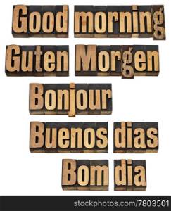 Good morning in five languages - English, German, French, Spanish and Portuguese - a collage of isolated words in vintage letterpress wood type