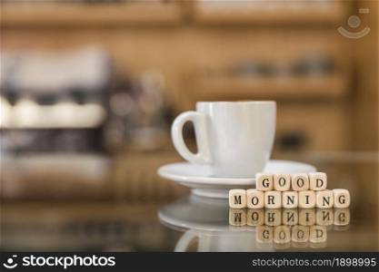 good morning wooden blocks with cup coffee glass counter. Resolution and high quality beautiful photo. good morning wooden blocks with cup coffee glass counter. High quality beautiful photo concept