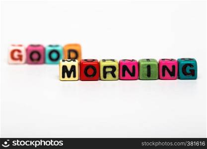 good morning - word made from multicolored child toy cubes with letters