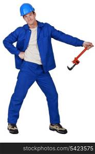 Goofy tradesman holding a pipe wrench