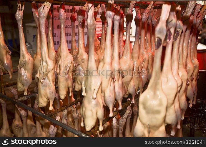 Goose meat hanging at a butcher&acute;s shop, Qingdao, Shandong Province, China