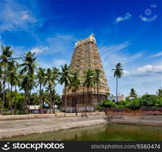 Gopura (tower) and temple tank of Lord Bhakthavatsaleswarar Temple. Built by Pallava kings in 6th century. Thirukalukundram (Thirukkazhukundram), near Chengalpet. Tamil Nadu, India