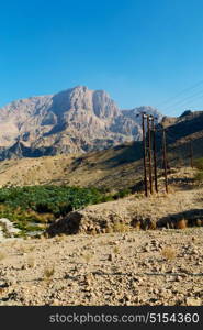 gorge and canyon the deep cloudy sky in oman the old mountain