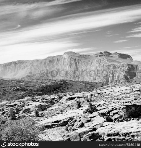 gorge and canyon the deep cloudy sky in oman the old mountain