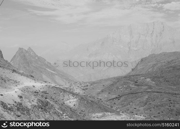 gorge and canyon the deep cloudy sky in oman the old mountain