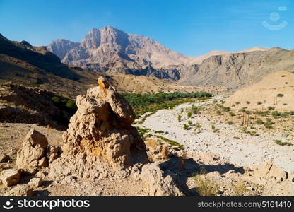 gorge and canyon the deep cloudy sky in oman the old mountain