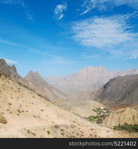 gorge and canyon the deep cloudy sky in oman the old mountain