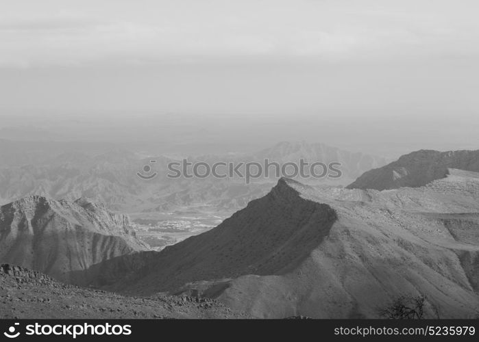 gorge and canyon the deep cloudy sky in oman the old mountain