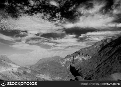 gorge and canyon the deep cloudy sky in oman the old mountain