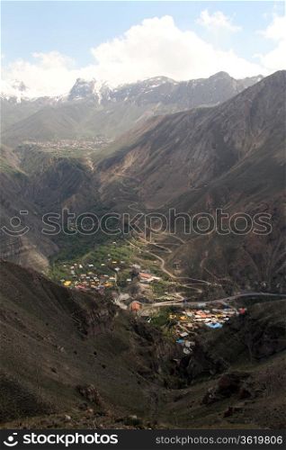 Gorge with village in iranian mountain, Iran