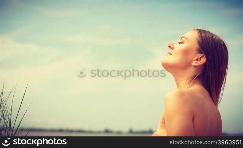 Gorgeous attractive young woman in summer.. Beauty of women. Young long haired attractive woman portrait. Gorgeous stunning lady in summer time. Girl taking sunbath.