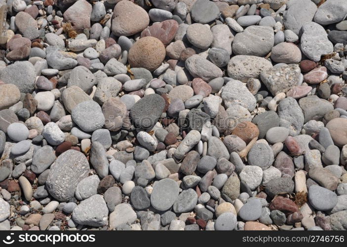 gorgeous beach pebble stones background or texture