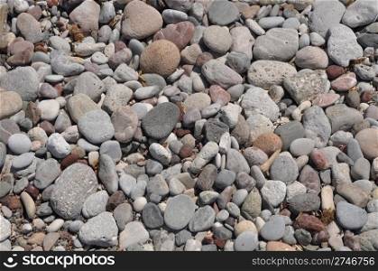 gorgeous beach pebble stones background or texture