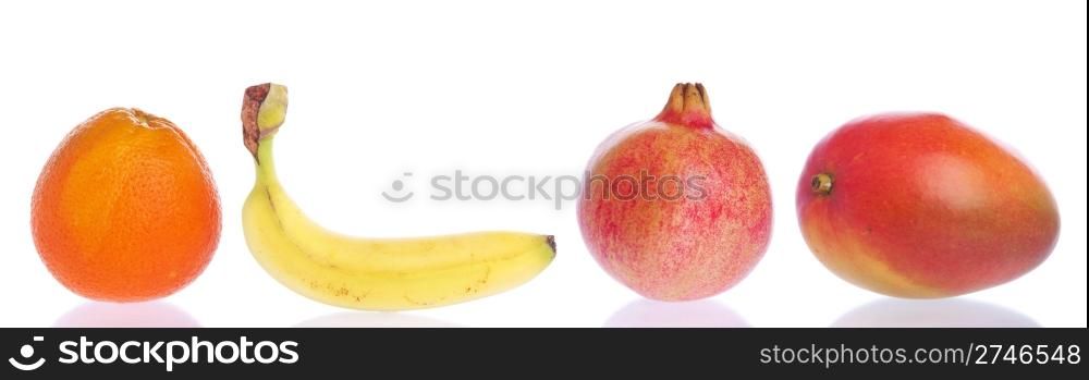 gorgeous fruits collection (orange, banana, pomegranate, mango) isolated on white background