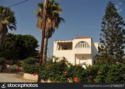 gorgeous greek house with lovely garden (sunset picture)