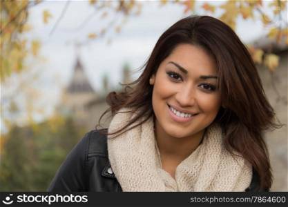 Gorgeous Latino woman outdoors during autumn
