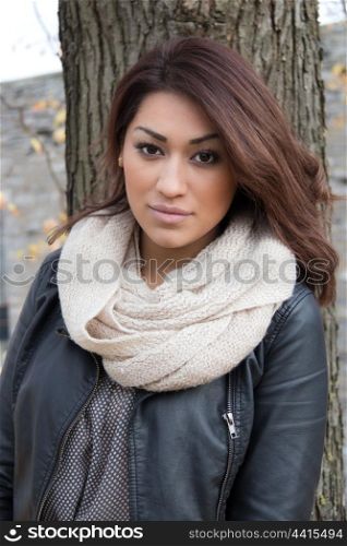 Gorgeous latinowoman posing outdoors