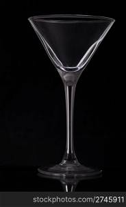 gorgeous martini cocktail glass on black background