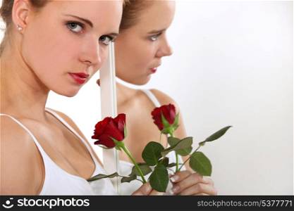 Gorgeous model with a red rose