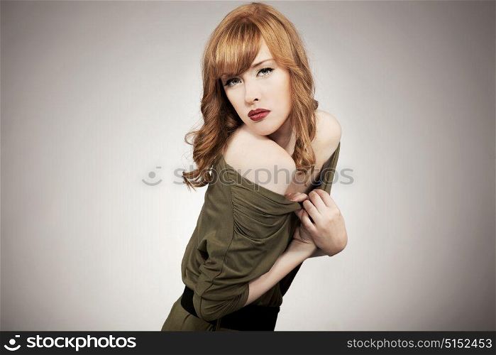 Gorgeous redhead strikes a pose