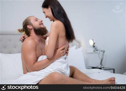 Gorgeous sexy couple enjoying sex in the house&rsquo;s bedroom, Concept of as emotional relationships passion and love