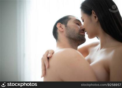 Gorgeous sexy couple enjoying sex on bed in the house&rsquo;s bedroom, Concept of as emotional relationships passion and love