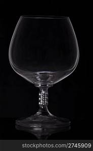 gorgeous whisky glass on black background