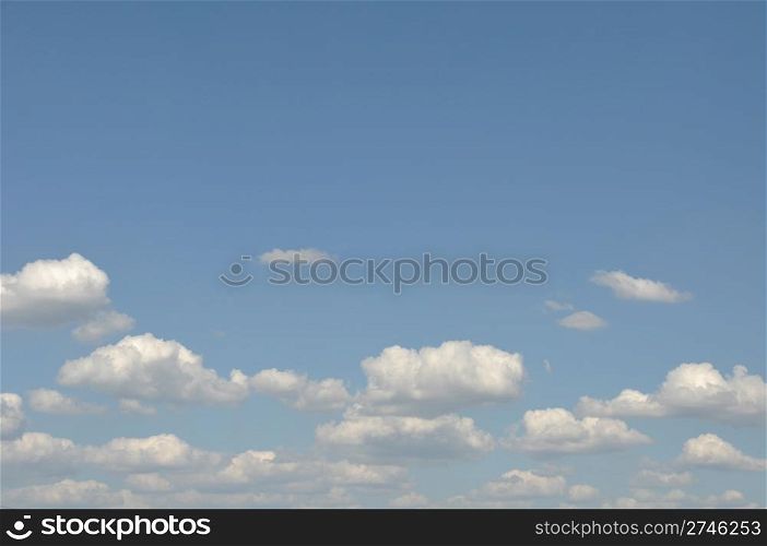 gorgeous white clouds in the blue sky (copy-space available at the top)