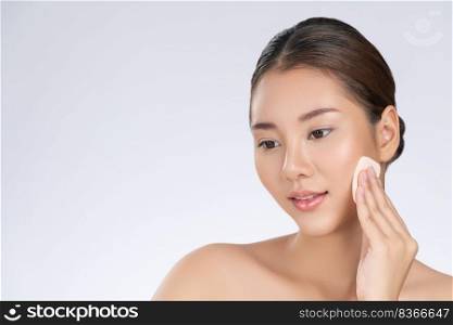 Gorgeous woman applying her cheek with dry powder. Portrait of younger with perfect makeup and healthy skin concept.. Gorgeous woman applying her cheek with dry powder. Beauty care, cosmetic concept