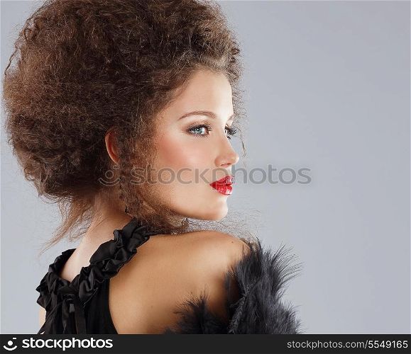 Gorgeous Woman Fashion Model with Waved Hair
