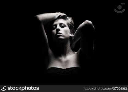 gorgeous woman in tense light. gorgeous woman in tense light in black and white