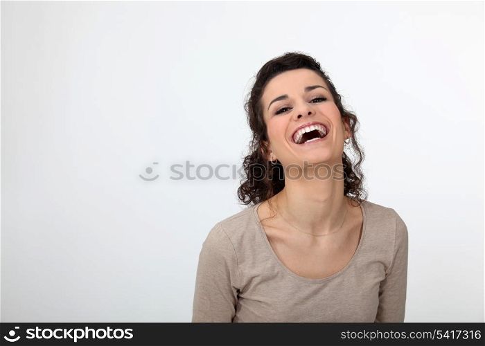 Gorgeous woman laughing out loud