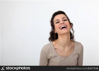 Gorgeous woman laughing out loud