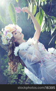 Gorgeous ypung woman with the flowery dress