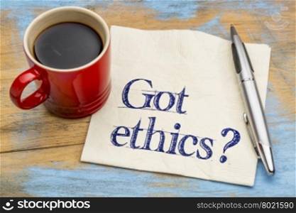 Got ethics? Are you ethical question. Handwriting on a napkin with cup of coffee.