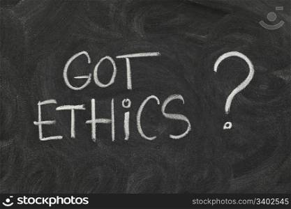 Got ethics? Are you ethical question handwritten with white chalk on blackboard with eraser smudges