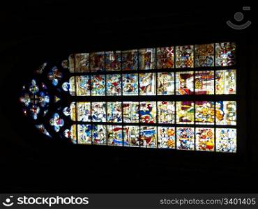 Gothic cathedral glass. Detail of a decorated gothic cathedral glass