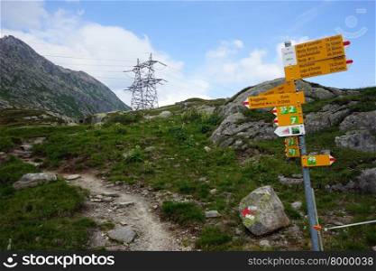 GOTTHARD PASS, SWITZERLAND - CIRCA AUGUST 2015 Signs on the footpath