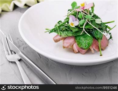 gourmet duck breast filet with basil salad