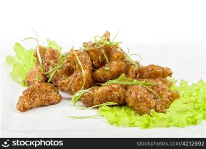 Gourmet fish fillet at caramel isolated on a white
