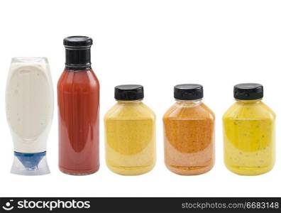 Gourmet ketchup mayonnaise and mustard isolated on white background