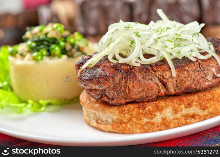 Gourmet steak meat with potato, vegetables and sauce
